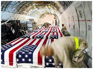 coffins-of-u-s-soldiers-inside-a-cargo-plane-at-kuwait-international-airport-in-april-2004